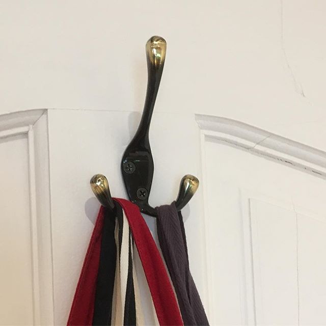 coat hook in a bronze effect on the back of the kitchen door
