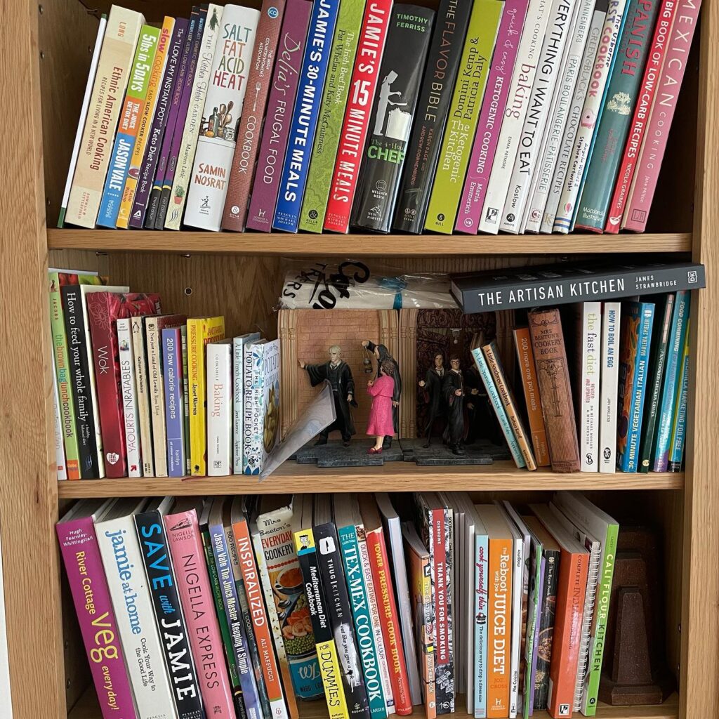 Photo of cookbooks on shelving