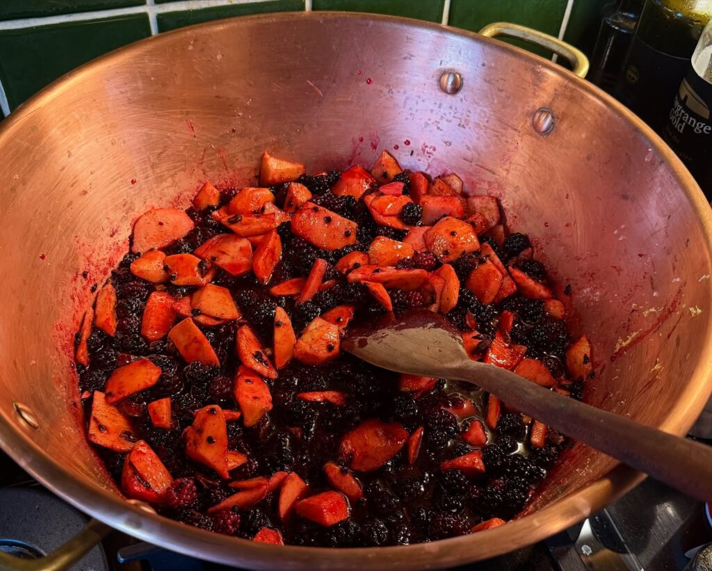 Apple and blackberry cooking for jam